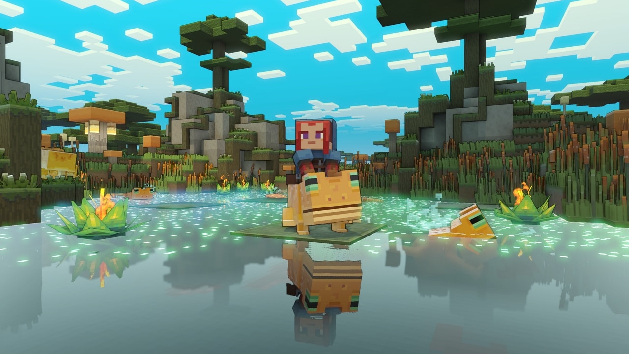カエルに乗った主人公が、明るい沼地の水の上を進むゲーム画面